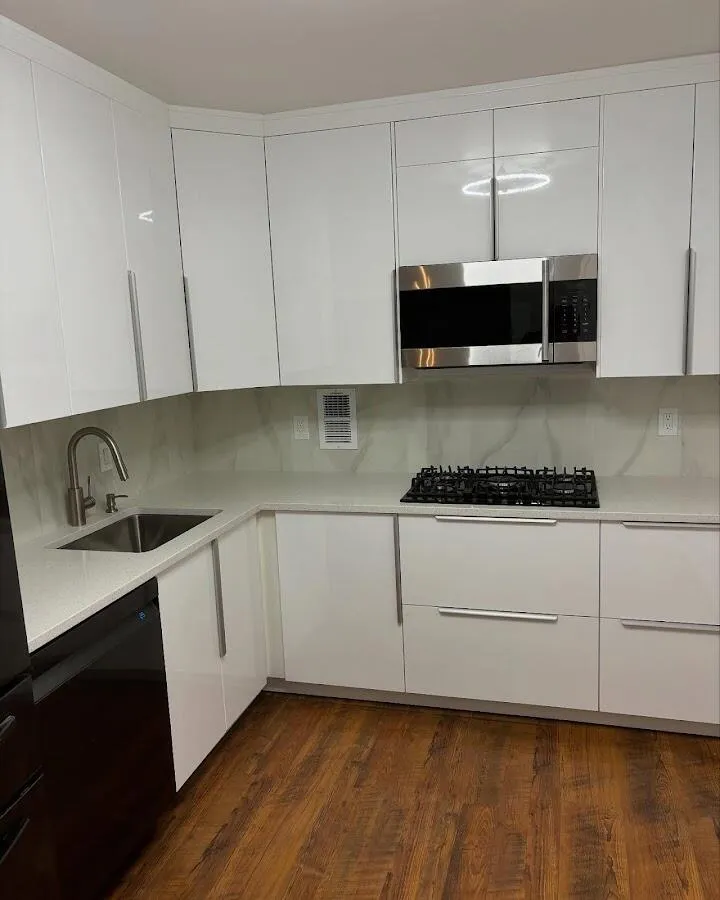 Restored kitchen with white cabinets after water damage in Whitemarsh Island